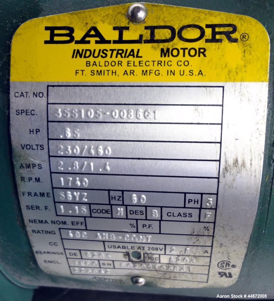 Used Lightnin Clamp-On Agitator, Model XJ-65.  0.65 Hp, 1/60/230/460 volt, 1740 rpm motor.  Requires an approximately 5/8" diameter shaft.