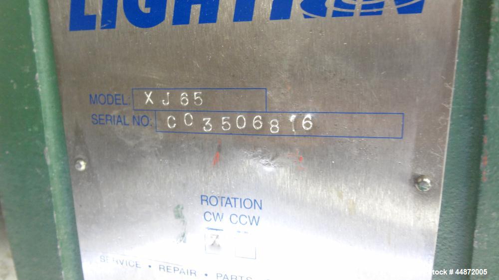 Used Lightnin Clamp-On Agitator, Model XJ-65.  0.65 Hp, 1/60/230/460 volt, 1740 rpm motor.  Requires an approximately 5/8" diameter shaft.