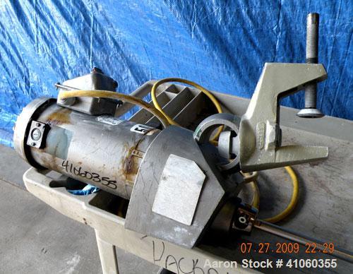 Used Lightnin Clamp-On Agitator, Model XJ-75VM. 3/4" diameter x 50" long 316 stainless steel shaft with a 8-1/2" diameter 316 stainless steel 3 blade prop. Driven by a 3/4 hp, 180 volt, 1750 rpm moto...
