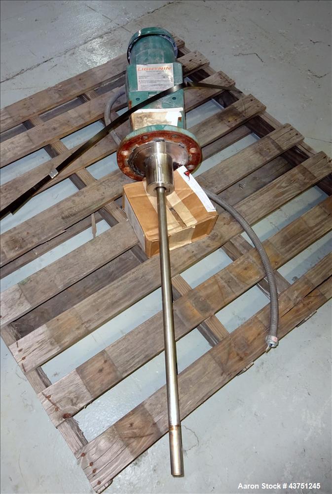 Used Lightnin Agitator, Model XJC-30. 1" Diameter x 28" long stainless steel shaft with a 3 blade turbine, driven by a 0.30hp, 3/60/208-230/460 volt, 1725/1450 rpm motor. Serial# 92/567114-02.