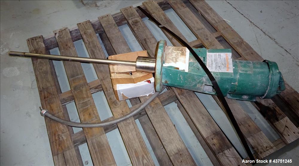 Used Lightnin Agitator, Model XJC-30. 1" Diameter x 28" long stainless steel shaft with a 3 blade turbine, driven by a 0.30hp, 3/60/208-230/460 volt, 1725/1450 rpm motor. Serial# 92/567114-02.