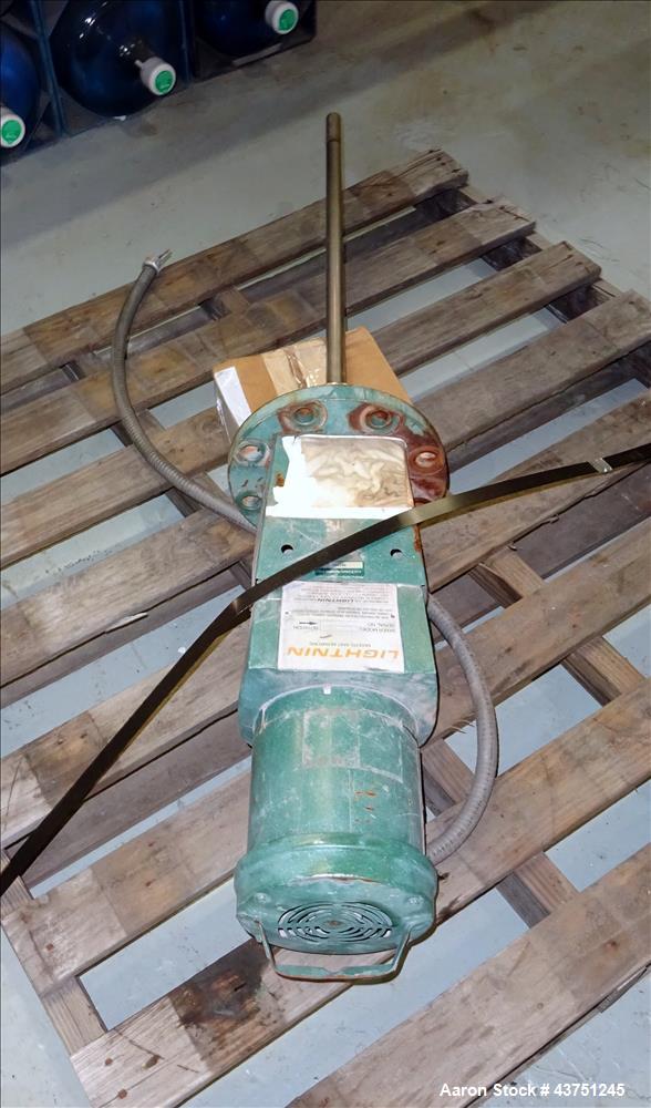 Used Lightnin Agitator, Model XJC-30. 1" Diameter x 28" long stainless steel shaft with a 3 blade turbine, driven by a 0.30hp, 3/60/208-230/460 volt, 1725/1450 rpm motor. Serial# 92/567114-02.