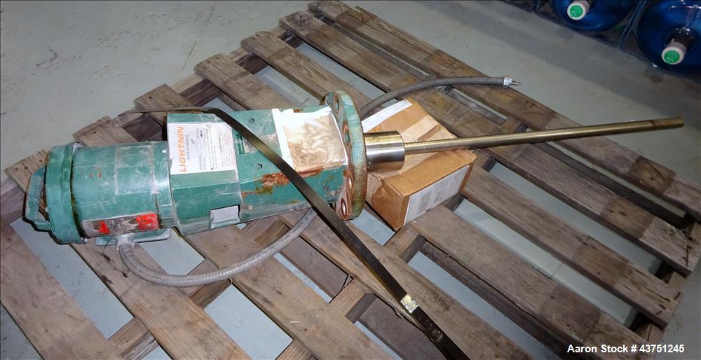 Used Lightnin Agitator, Model XJC-30. 1" Diameter x 28" long stainless steel shaft with a 3 blade turbine, driven by a 0.30hp, 3/60/208-230/460 volt, 1725/1450 rpm motor. Serial# 92/567114-02.