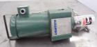 Used Lightnin Clamp-On Agitator, Model XJ-65.  0.65 Hp, 1/60/230/460 volt, 1740 rpm motor.  Requires an approximately 5/8