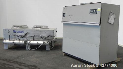 Used Liebert Deluxe System 3, 10 Ton Temperature Control System Consisting Of: (1) Liebert Model VH125AUCAEI indoor unit with evaporator coil and compressor unloaders. (1) Liebert rooftop air cooled ...
