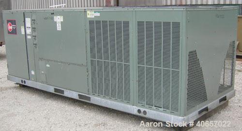 Used Rheem Standard Efficiency Series Self-Contained Cooling Package Unit, model RLKB-A240DM. 20 tons. Gross cooling capacity 242,000 BTU. Designed for outdoor use.