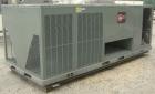 Used Rheem Standard Efficiency Series Self-Contained Cooling Package Unit, model RLKB-A240DM. 20 tons. Gross cooling capacity 242,000 BTU. Designed for outdoor use.