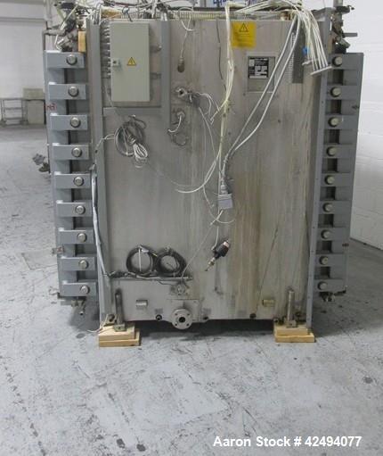 Used Getinge Sterilizer Autoclave, Model 91415. Stainless steel product contact surfaces, dual sided pass thru design with pneumatic door closure, 2010 liter chamber volume, approximately 870 mm wide...