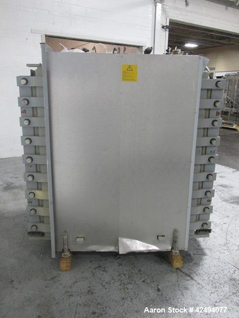 Used Getinge Sterilizer Autoclave, Model 91415. Stainless steel product contact surfaces, dual sided pass thru design with pneumatic door closure, 2010 liter chamber volume, approximately 870 mm wide...