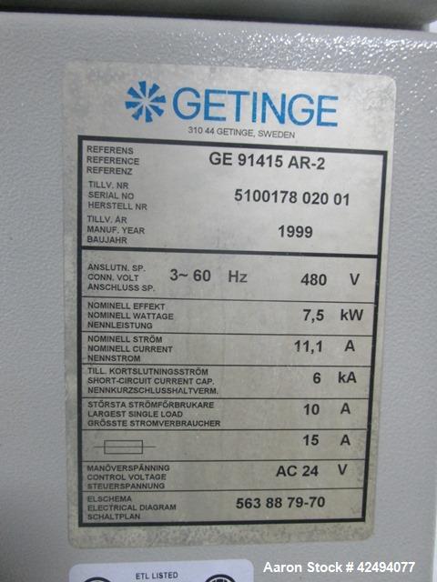Used Getinge Sterilizer Autoclave, Model 91415. Stainless steel product contact surfaces, dual sided pass thru design with pneumatic door closure, 2010 liter chamber volume, approximately 870 mm wide...