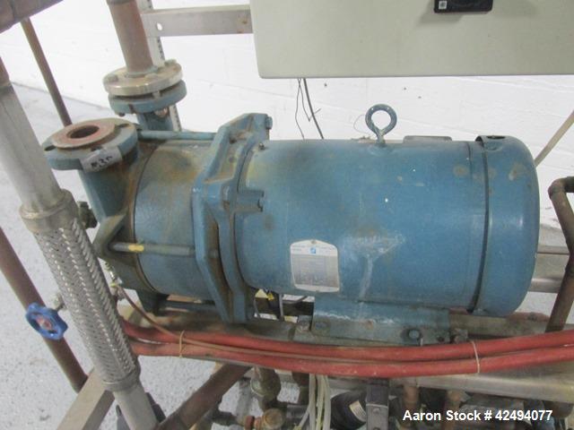 Used Getinge Sterilizer Autoclave, Model 91415. Stainless steel product contact surfaces, dual sided pass thru design with pneumatic door closure, 2010 liter chamber volume, approximately 870 mm wide...
