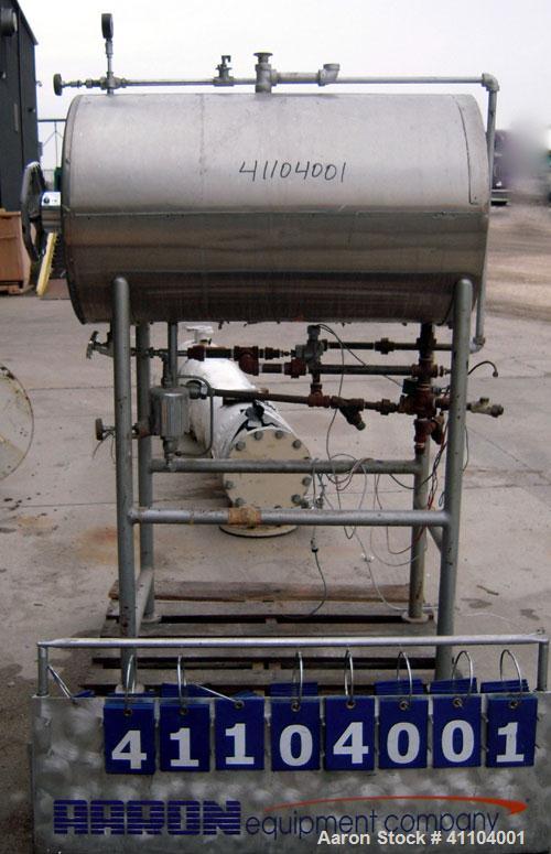 Used American Sterilizer Autoclave, 304 Stainless Steel. Chamber 21" diameter x approximately 38" deep. Provision for 2 shelves.  Rated 25 lbs @ 300 degrees F.  Mounts on a carbon steel frame on 4 le...