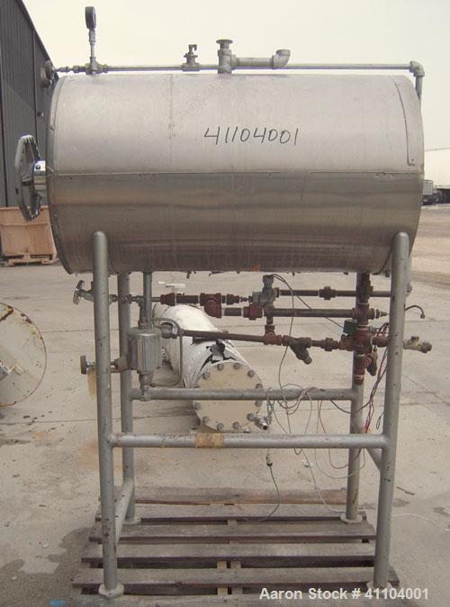 Used American Sterilizer Autoclave, 304 Stainless Steel. Chamber 21" diameter x approximately 38" deep. Provision for 2 shelves.  Rated 25 lbs @ 300 degrees F.  Mounts on a carbon steel frame on 4 le...