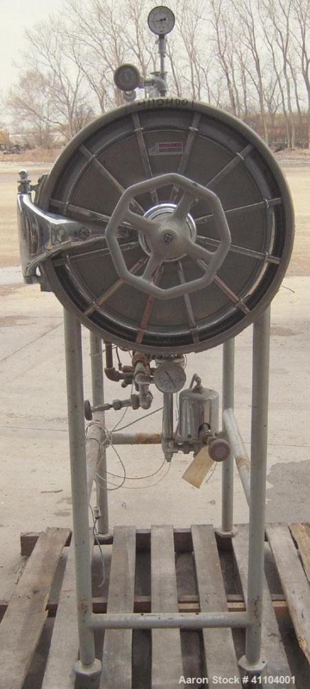 Used American Sterilizer Autoclave, 304 Stainless Steel. Chamber 21" diameter x approximately 38" deep. Provision for 2 shelves.  Rated 25 lbs @ 300 degrees F.  Mounts on a carbon steel frame on 4 le...