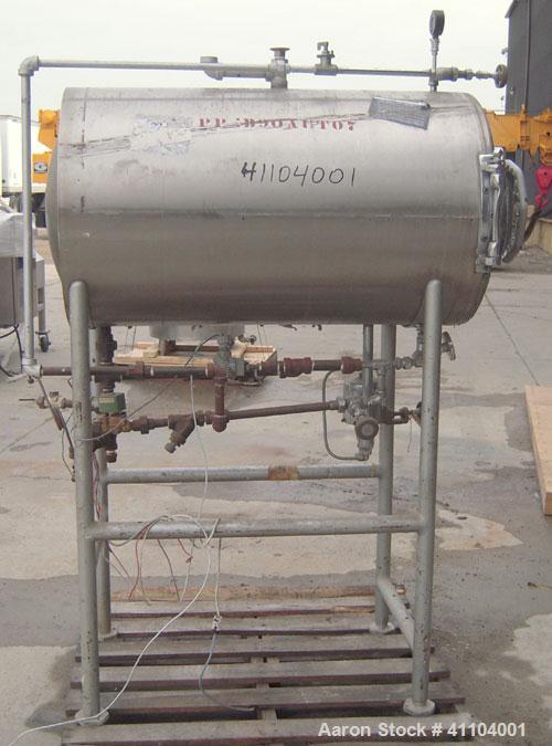 Used American Sterilizer Autoclave, 304 Stainless Steel. Chamber 21" diameter x approximately 38" deep. Provision for 2 shelves.  Rated 25 lbs @ 300 degrees F.  Mounts on a carbon steel frame on 4 le...
