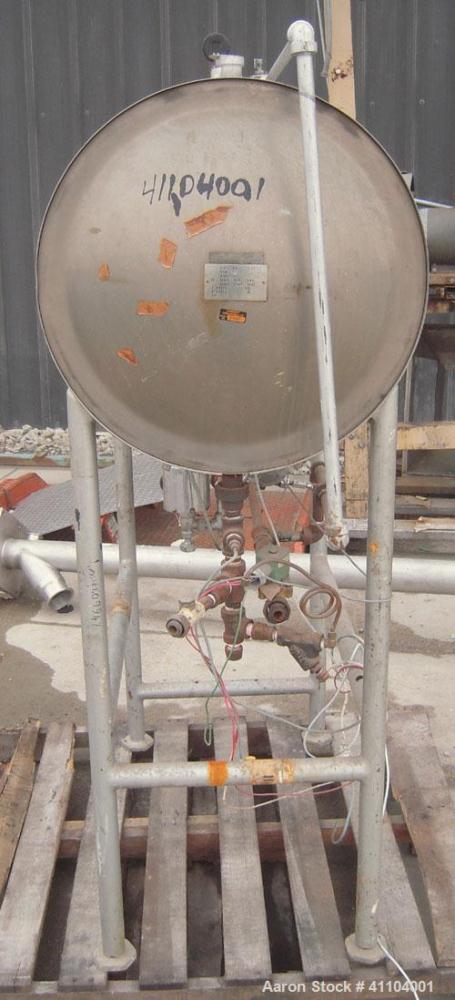 Used American Sterilizer Autoclave, 304 Stainless Steel. Chamber 21" diameter x approximately 38" deep. Provision for 2 shelves.  Rated 25 lbs @ 300 degrees F.  Mounts on a carbon steel frame on 4 le...