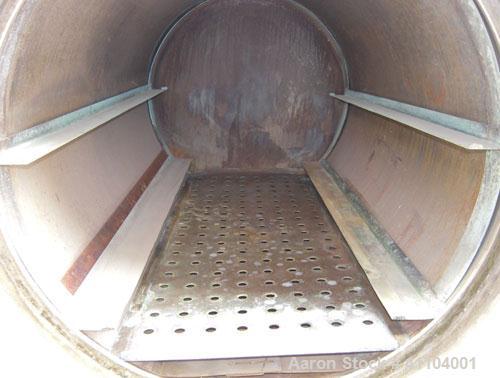 Used American Sterilizer Autoclave, 304 Stainless Steel. Chamber 21" diameter x approximately 38" deep. Provision for 2 shelves.  Rated 25 lbs @ 300 degrees F.  Mounts on a carbon steel frame on 4 le...