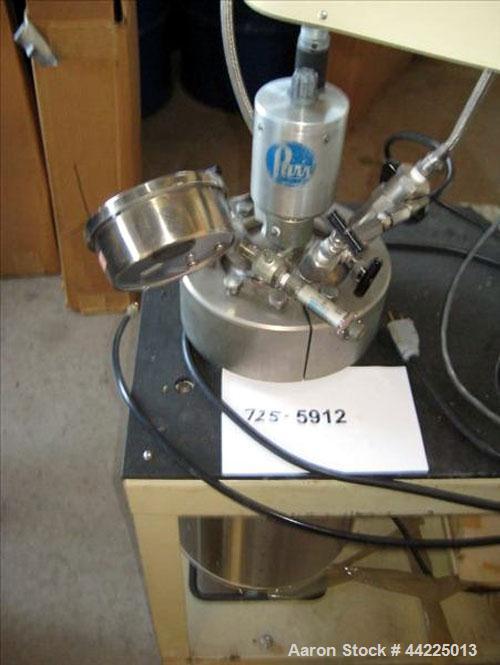 Used Parr Autoclave, 2 Gallon, Model 4552M, Stainless Steel. Rated 1900 psig at 350 degrees F. With drive unit, electrically heated, on cart with controls, 230 volts. Serial #906.