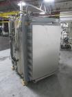 Used Getinge Sterilizer Autoclave, Model 91415. Stainless steel product contact surfaces, dual sided pass thru design with pneumatic door closure, 2010 liter chamber volume, approximately 870 mm wide...