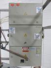 Used Getinge Sterilizer Autoclave, Model 91415. Stainless steel product contact surfaces, dual sided pass thru design with pneumatic door closure, 2010 liter chamber volume, approximately 870 mm wide...