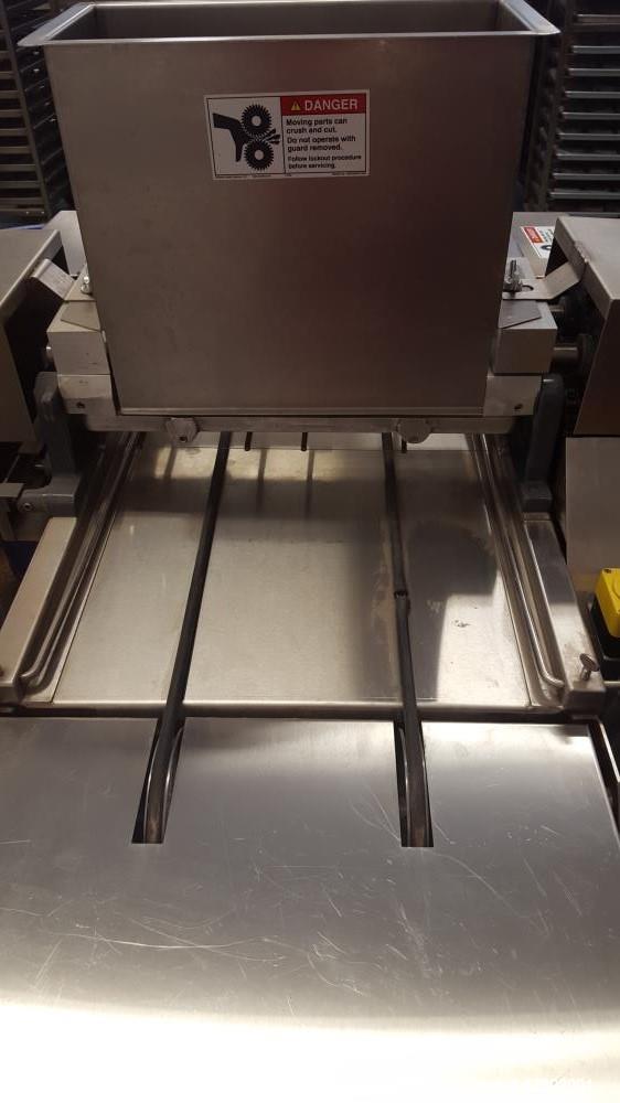 Used Magna Mixer Co. Handy "V" Cookie Depositer, Model 17V-SX3-G. 1750 dozen wire-cut uniform cookies per hour. (2) variable speed controllers, one of for pan speed and product spacing, one for contr...