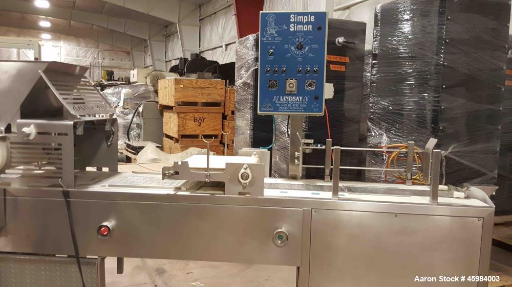 Used- Simple Simon Pie Machine, Model 4700. Capable of producing pies ranging from 25 -1000 grams in volume with any type of...