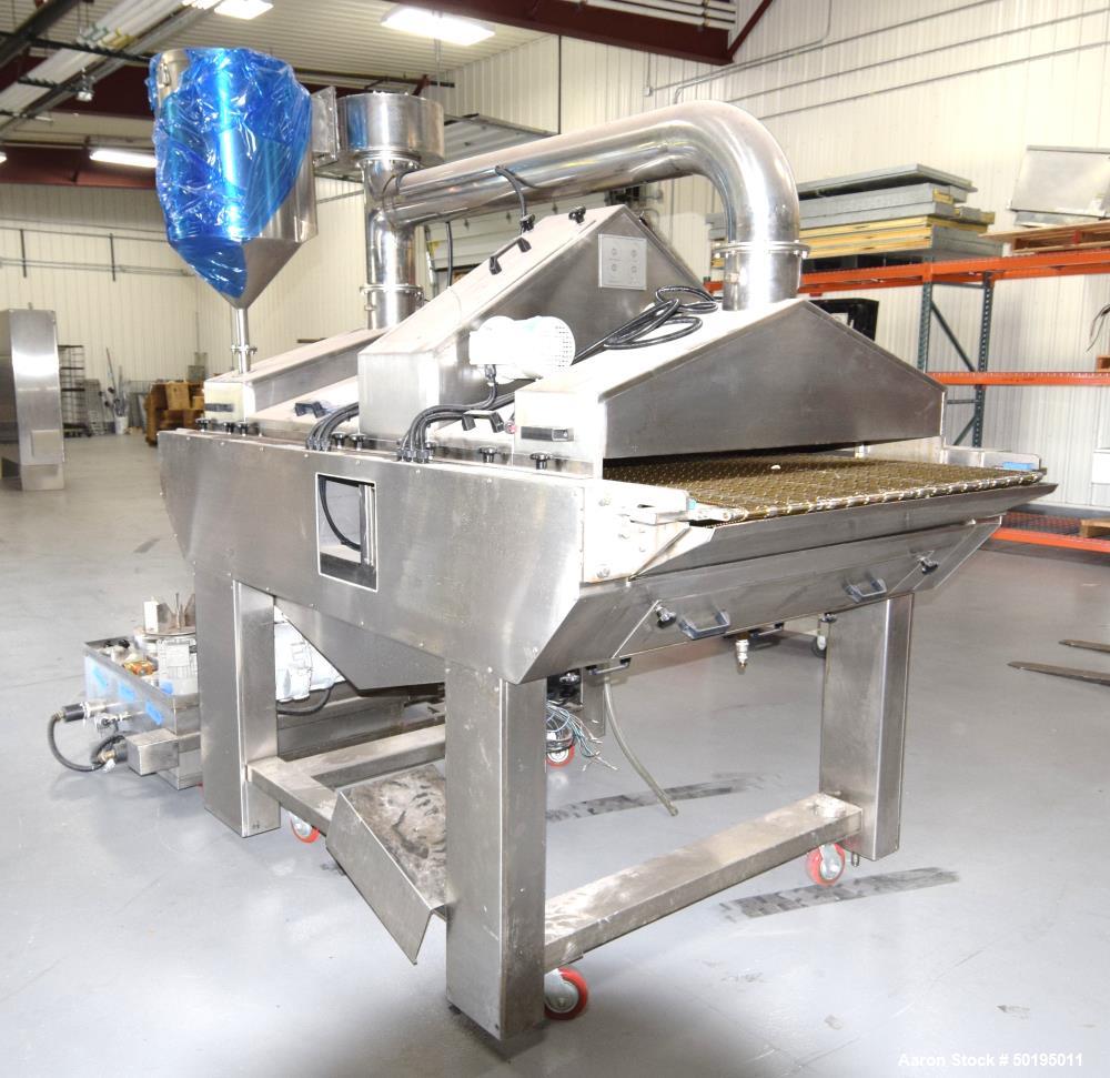 Used Oil Spray Coating Machine. Includes wire mesh belt conveyor, spray applicators and oil recirculation unit. Mounted on casters.  ADD 18% BP AND $500 LOADING FEE.
