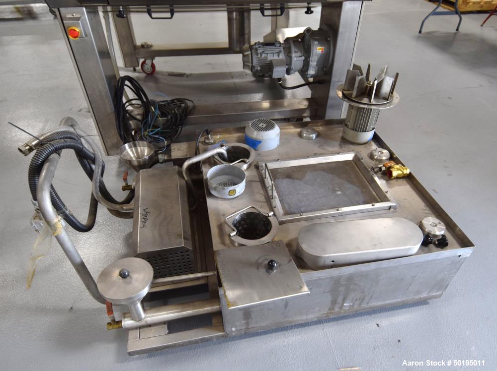 Used Oil Spray Coating Machine. Includes wire mesh belt conveyor, spray applicators and oil recirculation unit. Mounted on casters.  ADD 18% BP AND $500 LOADING FEE.