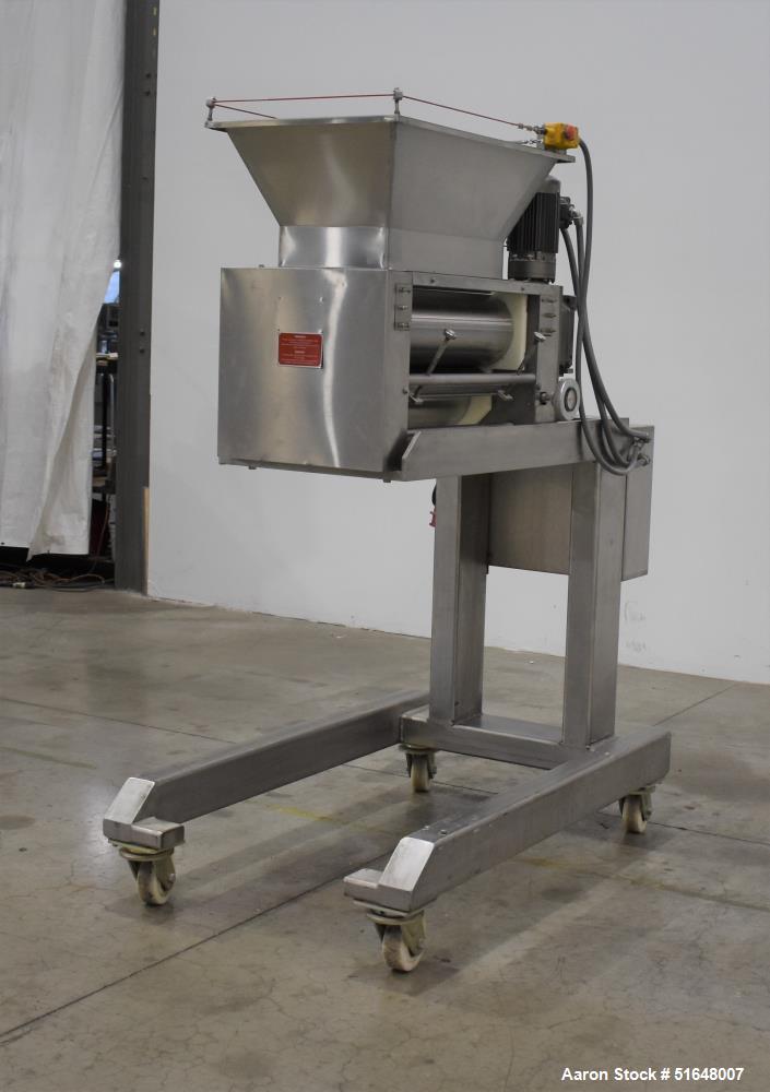Used- Dough 3 Roll Extruder / Pre-Sheeter. Approximate 24" wide rolls. (2) Smooth rolls, (1) grooved roll. Grooved roll driv...
