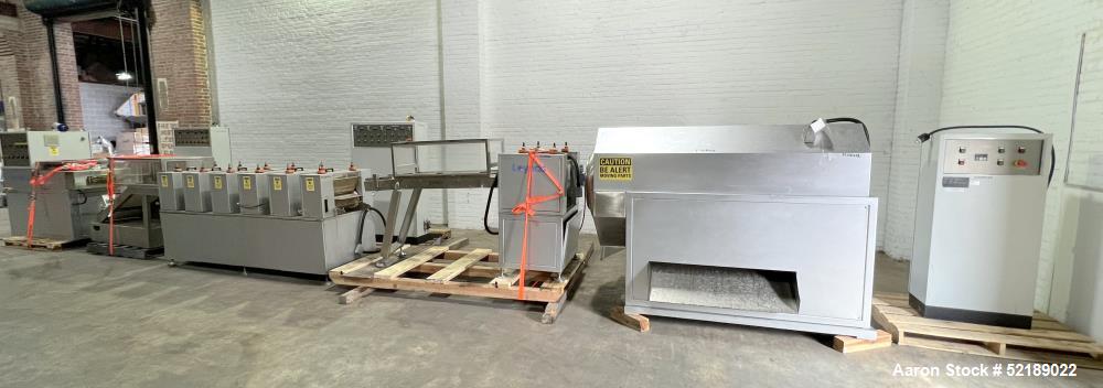 Used- Loynds 300 mm Wide Rolling & Scoring Line. Designed to make chiclets. Consisting of model GFL Dual Twin Screw Extruder...