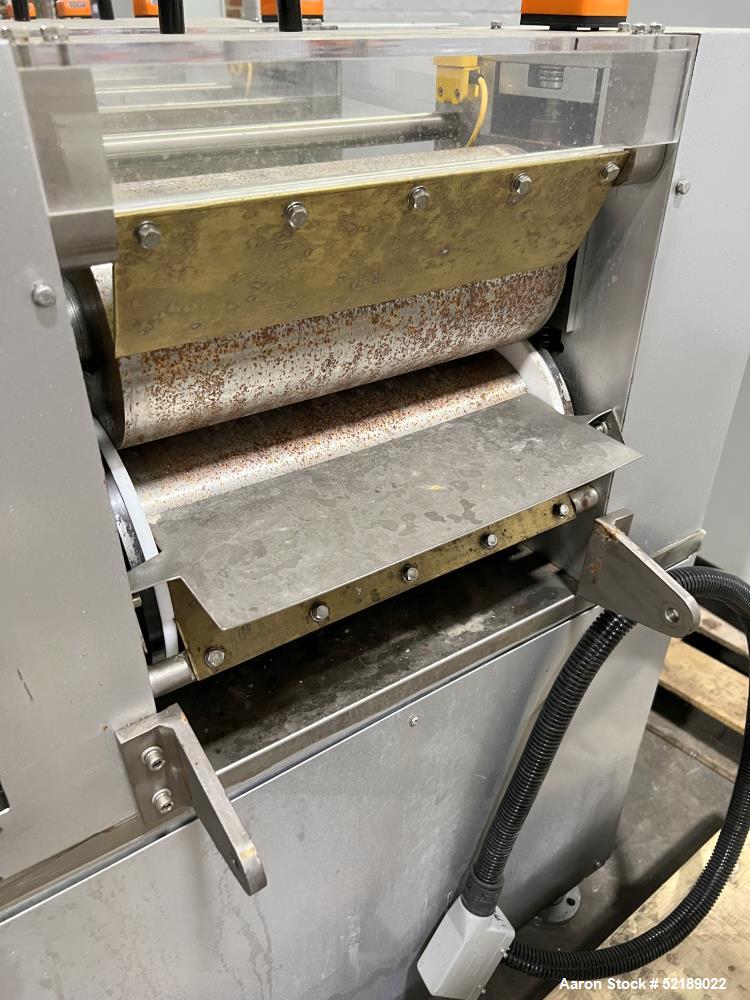 Used- Loynds 300 mm Wide Rolling & Scoring Line. Designed to make chiclets. Consisting of model GFL Dual Twin Screw Extruder...