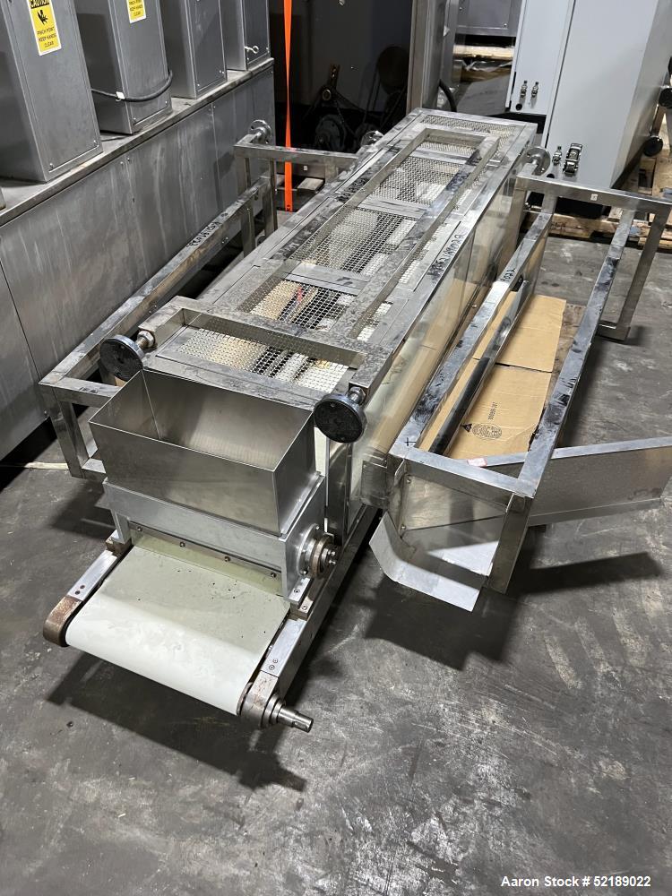 Used- Loynds 300 mm Wide Rolling & Scoring Line. Designed to make chiclets. Consisting of model GFL Dual Twin Screw Extruder...