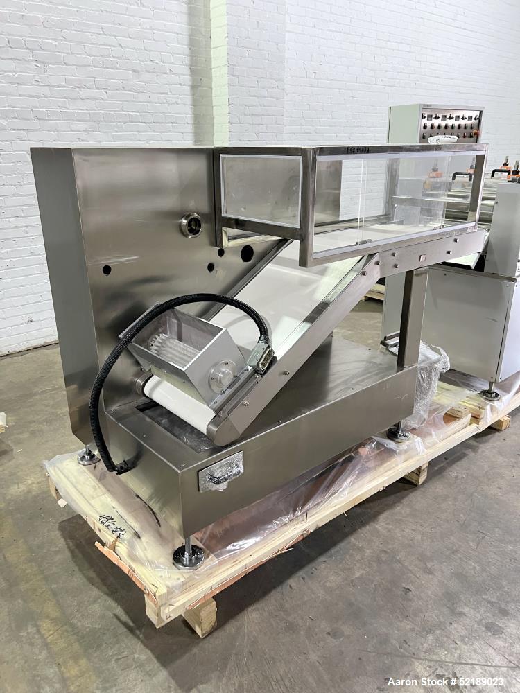 Used- Loynds 300 mm Wide Rolling & Scoring Line. Designed to make chiclets. Consisting of model GFL Dual Twin Screw Extruder...