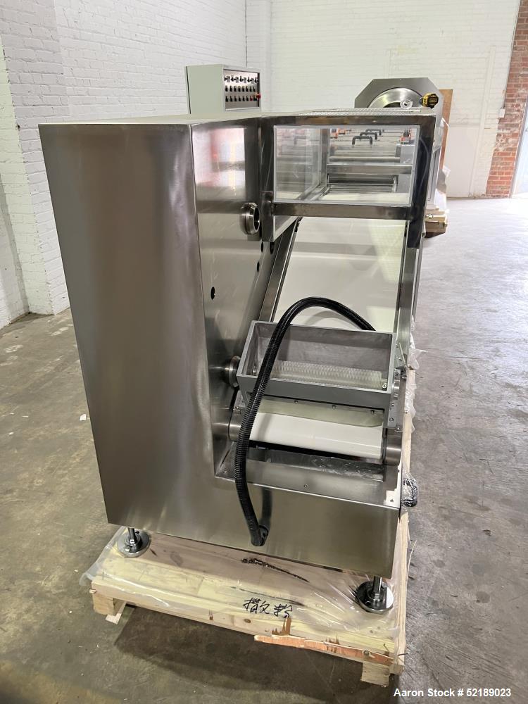 Used- Loynds 300 mm Wide Rolling & Scoring Line. Designed to make chiclets. Consisting of model GFL Dual Twin Screw Extruder...