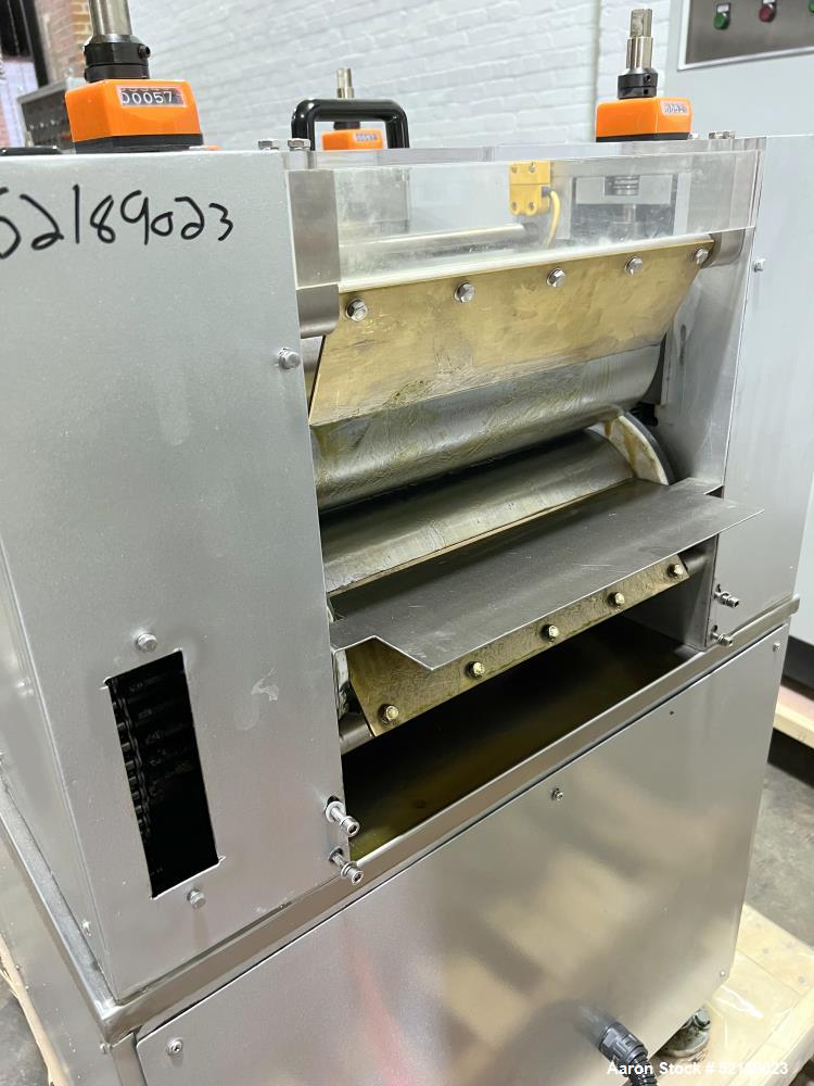 Used- Loynds 300 mm Wide Rolling & Scoring Line. Designed to make chiclets. Consisting of model GFL Dual Twin Screw Extruder...