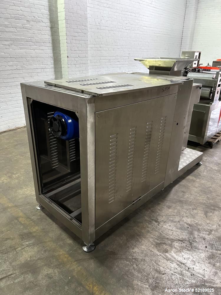Used Shangha Target 11" Rolling & Scoring Line. Designed to make chiclets. Consisting of: Twin Screw extruder missing screws and die with motor drive, (3) sets of sheeting rollers measuring approxima...