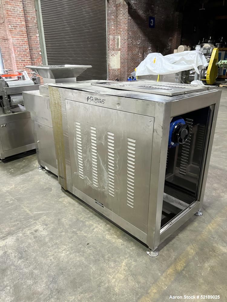 Used Shangha Target 11" Rolling & Scoring Line. Designed to make chiclets. Consisting of: Twin Screw extruder missing screws and die with motor drive, (3) sets of sheeting rollers measuring approxima...