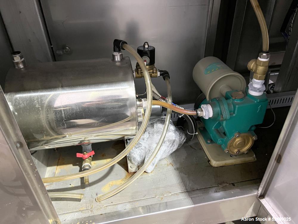 Used Shangha Target 11" Rolling & Scoring Line. Designed to make chiclets. Consisting of: Twin Screw extruder missing screws and die with motor drive, (3) sets of sheeting rollers measuring approxima...