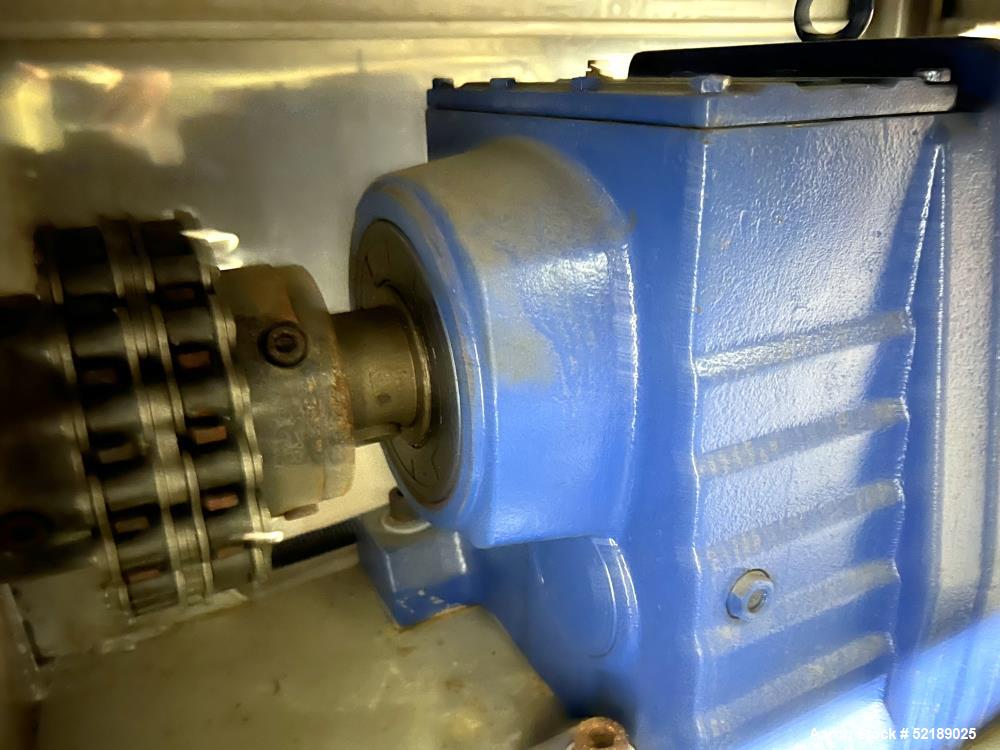 Used Shangha Target 11" Rolling & Scoring Line. Designed to make chiclets. Consisting of: Twin Screw extruder missing screws and die with motor drive, (3) sets of sheeting rollers measuring approxima...