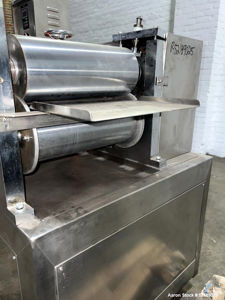 Used- Shangha Target 11" Rolling & Scoring Line. Designed to make chiclets. Consisting of: Twin Screw extruder missing screw...