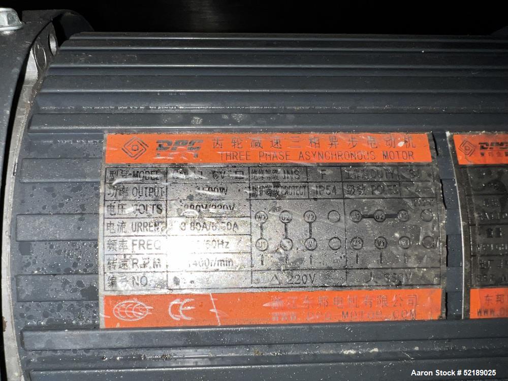 Used Shangha Target 11" Rolling & Scoring Line. Designed to make chiclets. Consisting of: Twin Screw extruder missing screws and die with motor drive, (3) sets of sheeting rollers measuring approxima...
