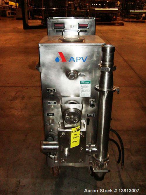 Used- APV/Crepaco Fruit Feeder, Model G-9755. All stainless steel construction, on casters.
