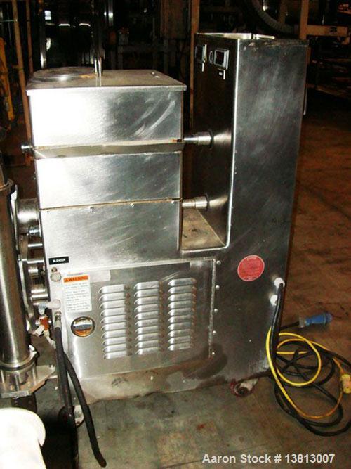 Used- APV/Crepaco Fruit Feeder, Model G-9755. All stainless steel construction, on casters.