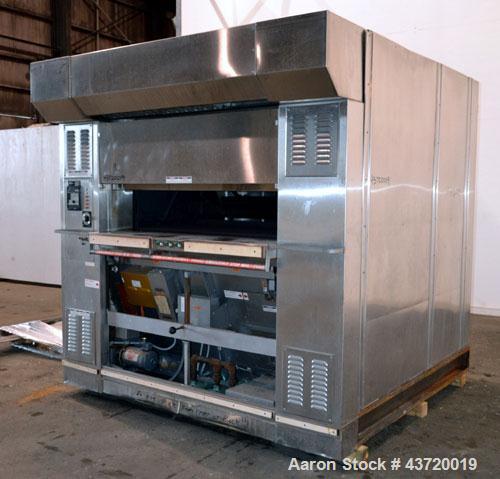 Used Baxter Revolving Tray Oven, Model OV850G-12A.  Natural gas fired, 150,000 BTU.  (4) Approximately 58" wide x 26" deep carbon steel trays, manual front door with (2) windows, approximate 12" open...