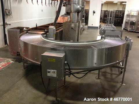 Used Belshaw 400 Donut Line. Including: infeed, double proof-box, fryer, fryer hood, 180 degree belt, small in- feed belt, Waterfall glazer, cooling belt, shortening filter and cake depositor, includ...