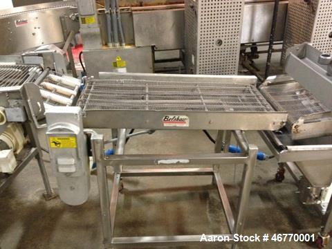 Used Belshaw 400 Donut Line. Including: infeed, double proof-box, fryer, fryer hood, 180 degree belt, small in- feed belt, Waterfall glazer, cooling belt, shortening filter and cake depositor, includ...