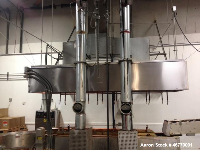 Used Belshaw 400 Donut Line. Including: infeed, double proof-box, fryer, fryer hood, 180 degree belt, small in- feed belt, Waterfall glazer, cooling belt, shortening filter and cake depositor, includ...