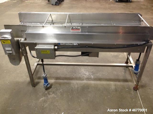Used Belshaw 400 Donut Line. Including: infeed, double proof-box, fryer, fryer hood, 180 degree belt, small in- feed belt, Waterfall glazer, cooling belt, shortening filter and cake depositor, includ...