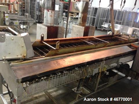 Used Belshaw 400 Donut Line. Including: infeed, double proof-box, fryer, fryer hood, 180 degree belt, small in- feed belt, Waterfall glazer, cooling belt, shortening filter and cake depositor, includ...