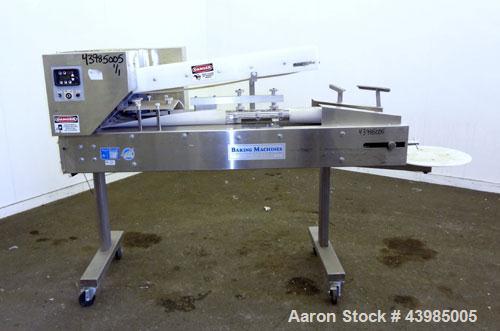 Used Baking Machines Table Top Bagel Divider / Former, Model BM-DF-3000.  304 Stainless steel construction. Approximately 3000 bagels per hour. Scaling range from 1 oz. to 6 oz.  3” Wide x 42” long i...